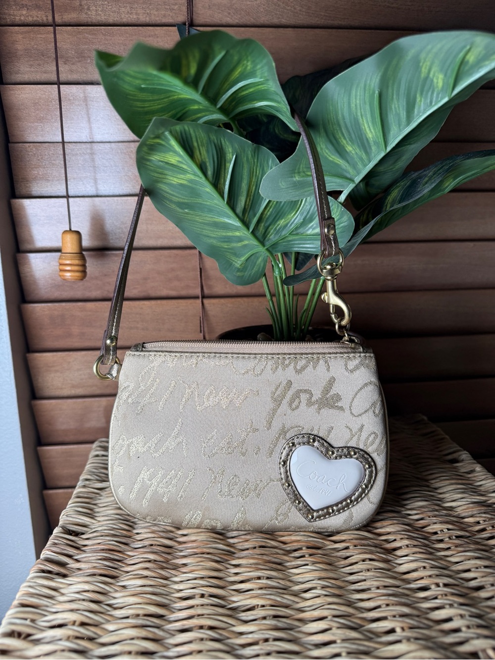 Coach Beige Script Wristlet with Heart Patch